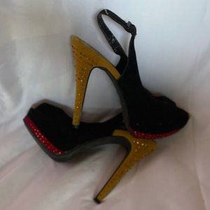 black yellow and red sparkly suede shoes.